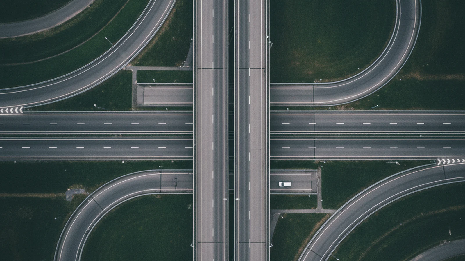 Multi-level motorway interchange seen from directly overhead